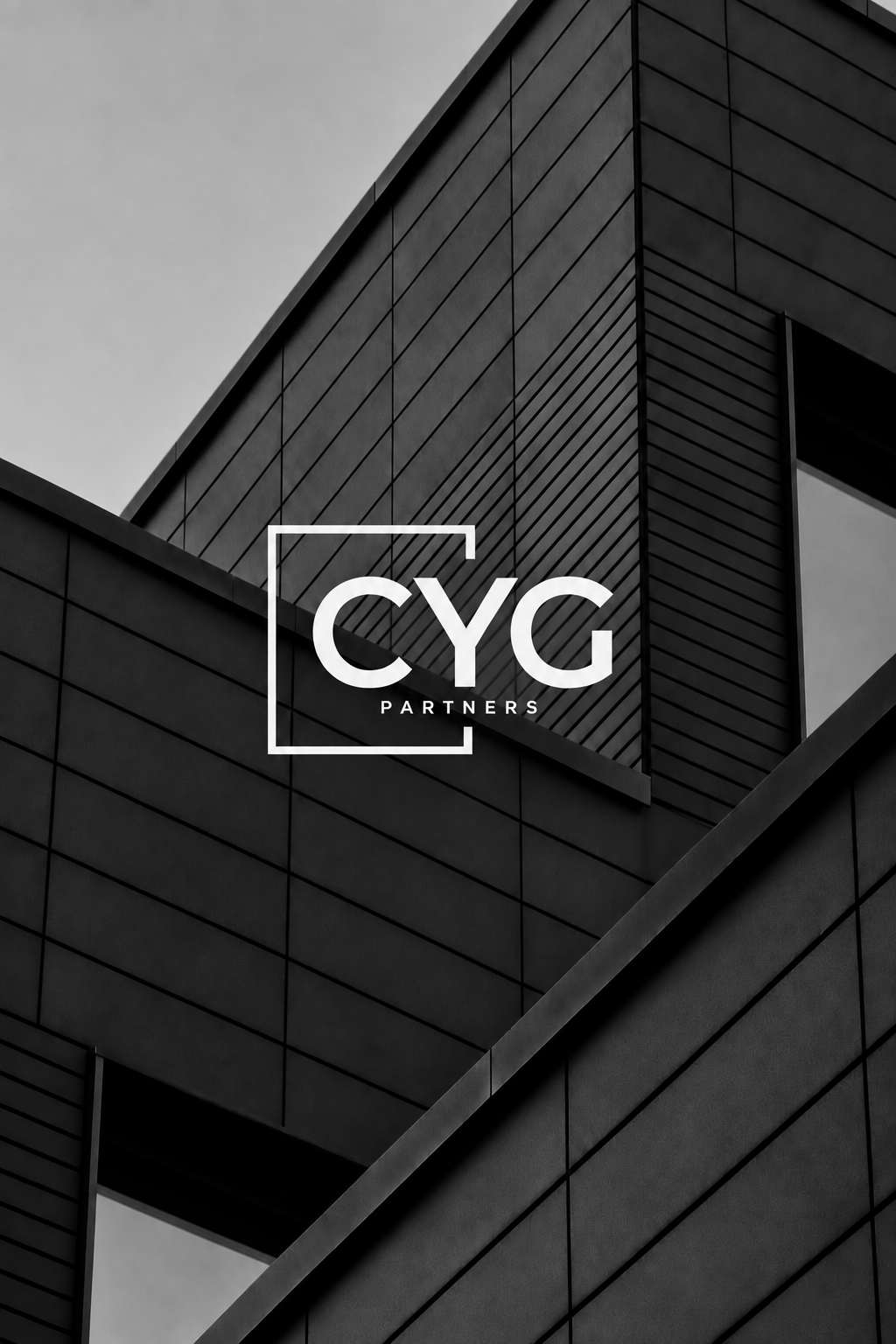 CYG Partners logo against a building facade